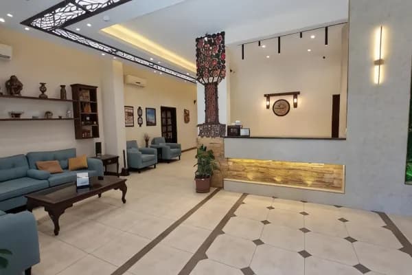 The bright and spacious lobby of Rumman Hotel